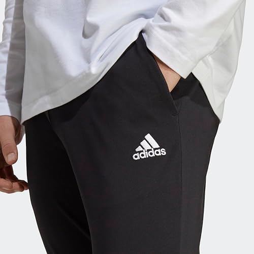 Miniatura 7 de adidas Pantalones Essentials de punto único con puños cónicos para hombre