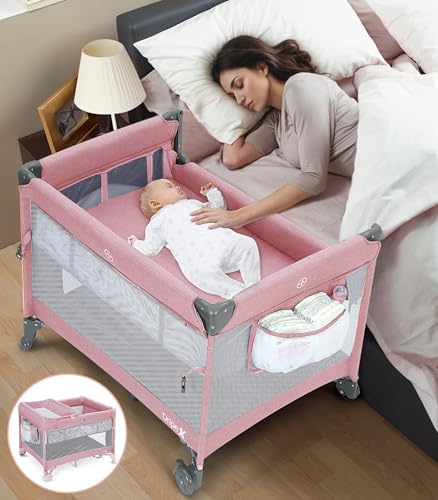 Image of Dripex Pack and Play, 5 in 1 Baby Bassinet Bedside Sleeper, Baby Bedside Crib with Mattress, Changing Table, Removable Rocker, Foldable Playard for Newborn to Toddlers, Portable Playpen Baby Bed, Pink