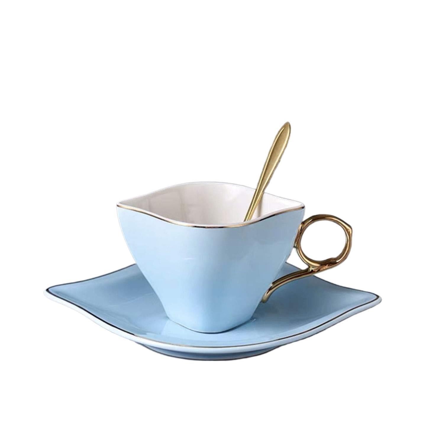 Tazzine da caffè in ceramica con piattini e cucchiaino in acciaio