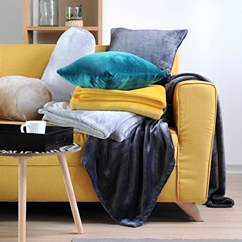Plaid canapé douillet moutarde pour des soirées cocooning