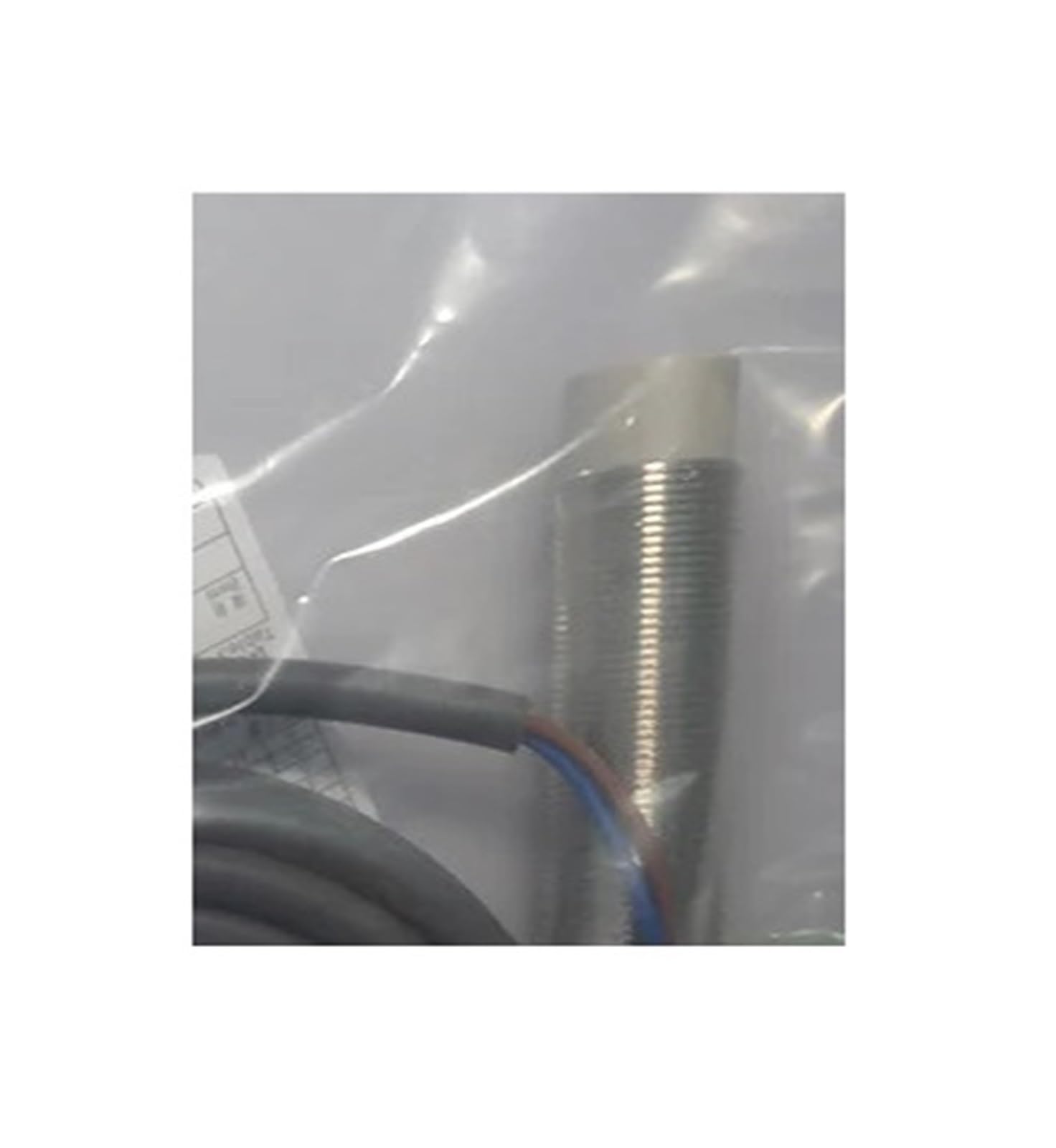 Capteur E2E-X14MD2-M1-Z résout les pannes de détection sur convoyeur