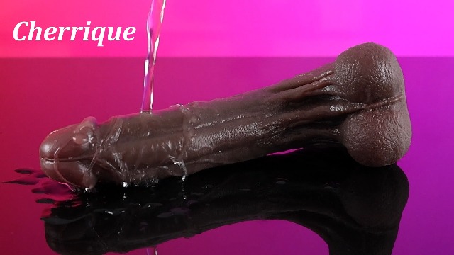 ignite 9 inch vibrating dildo with suction cup Loving Joy 9 Inch Realistic Silicone Dildo with Suction Cup and Balls Black main image 1