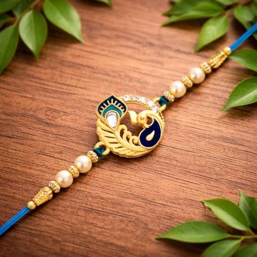 Image of Riddhika Ventures Religious Meenakari Om and Peacock Feather Rakhi With Roli Chawal And Greeting Card