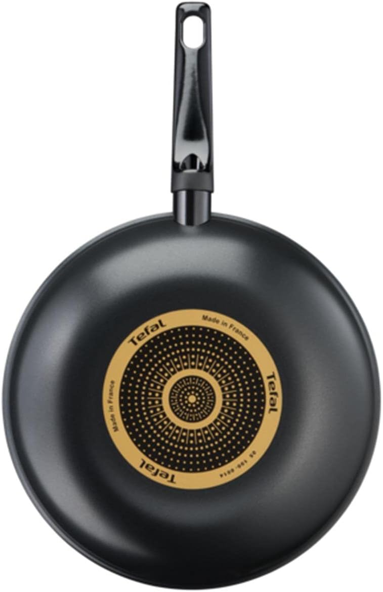 Bawah view of the Tefal SimpleCook 28 cm Wok Pan, showing the diffusion base and Tefal branding.