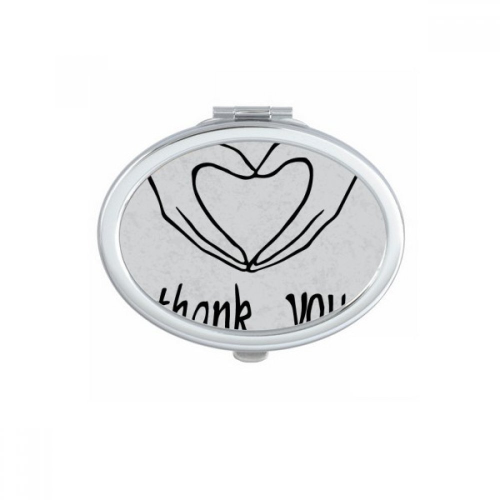 Miroir compact portable ovale pour vos retouches maquillage