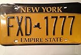 New York Empire State License Plate black numbers on yellow backround