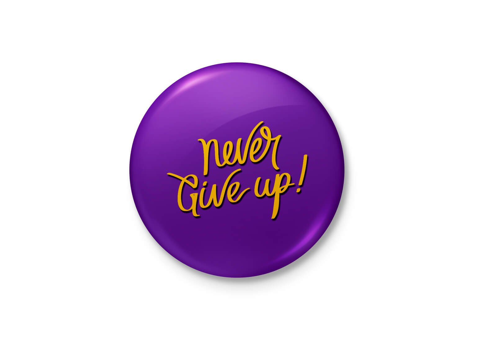 alterEgo Never Give Up Badge with safety-pin back