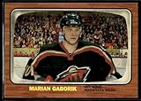 2002-03 Topps Heritage #16 Marian Gaborik Minnesota Wild Official Hockey Card in Raw (NM or Better) Condition