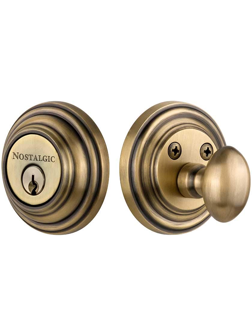 Nostalgic Warehouse 702273 Classic Rosette Single Cylinder Deadbolt in Antique Brass,