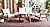 SAFAVIEH Outdoor Collection Deacon Natural/Beige Cushion with Black Piping 4-Piece Conversation Patio Set
