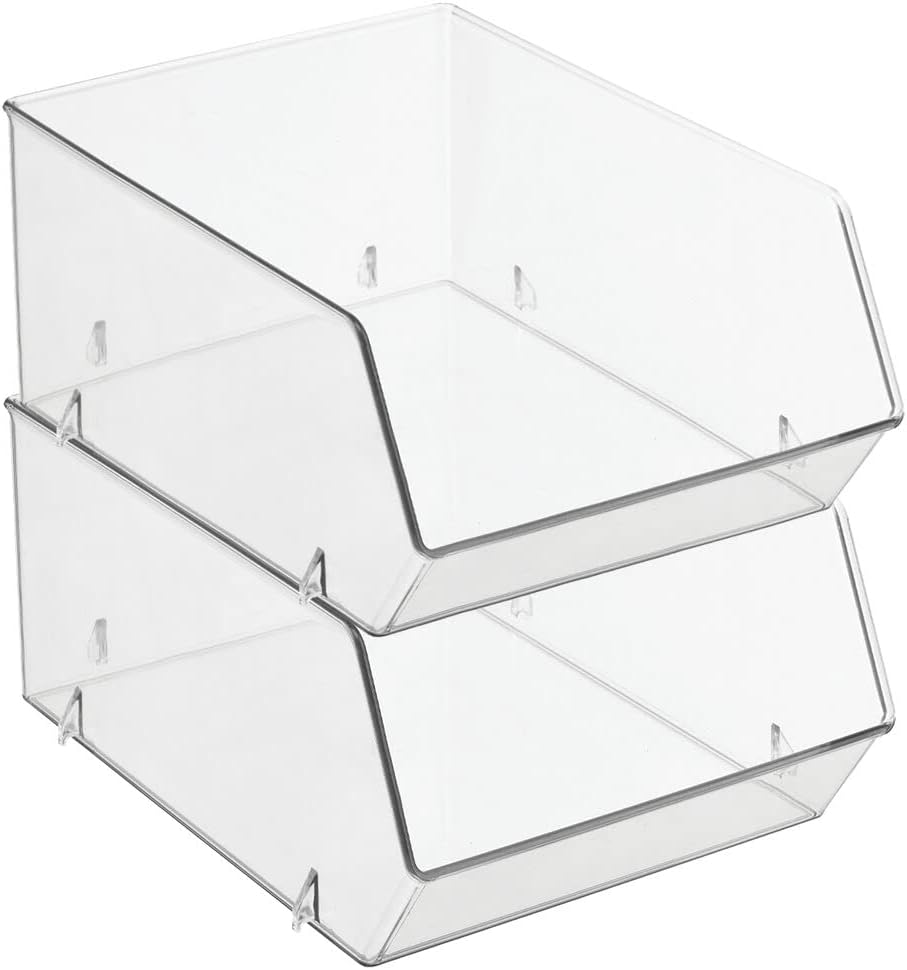 Two empty clear plastic stacking bins, one placed on top of the other, ready for use.