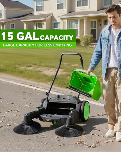 Walk-behind hand push floor sweeper in use on outdoor surface