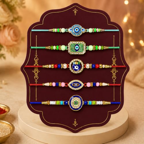 Image of DeoDap Rakhi with Chocolate for Brother - Evil Eye Design Stylish Rakhis 5 Pcs with Chocolate (32g), Tea Light Candle 2 Pc, Silver Color Pooja Coin, Greeting Card & Tilak Set | Raksha Bandhan Combo