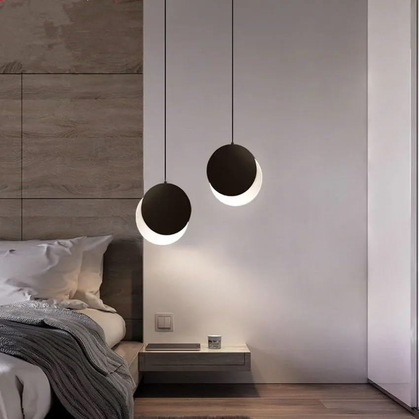 Lampe suspendue éclipse pour éclairer un grand salon sombre