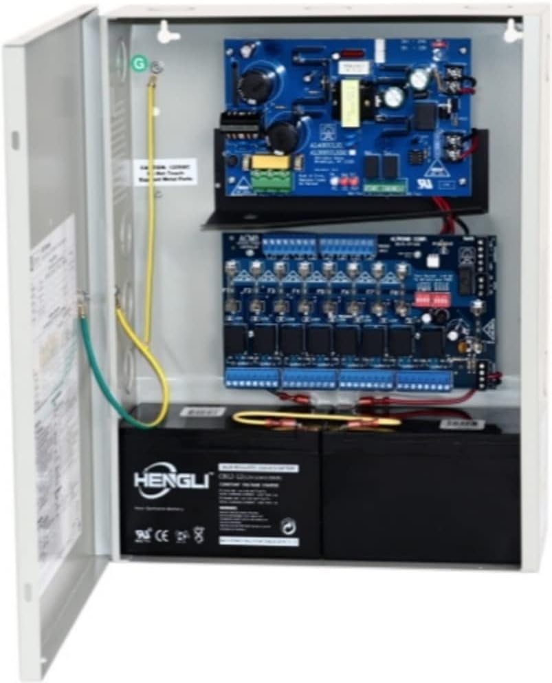 Altronix AL400ULACM Access Power Controller inside its enclosure, showing the main power supply board, the 8-fused output distribution board, and two sealed lead-acid batteries at the bottom.