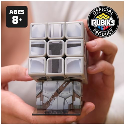 Image of Rubik's Cube, Star Wars Mandalorian Cuber with Display, The Mandalorian Problem-Solving Brain Teaser, Classic Color-Matching Puzzle, Fidget Toy for Kids, Collectible Star Wars Toy, for Ages 8 & Up