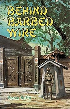 Paperback Behind Barbed Wire Book