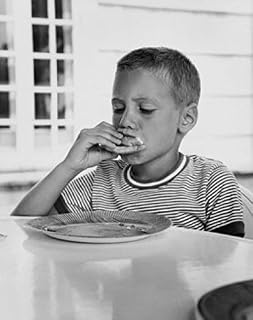 Posterazzi Close-up of a boy having breakfast Poster Print, (18 x 24)