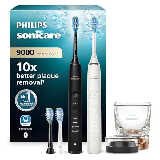 Philips Sonicare DiamondClean 9000 Elektrische Zahnbürste Doppelpack - 2 Schallzahnbürsten, 1x Ladeglas, 4x Premium Bürstenköpfe, neue Generation, schwarz & rosé-gold (Model: HX9914/61)