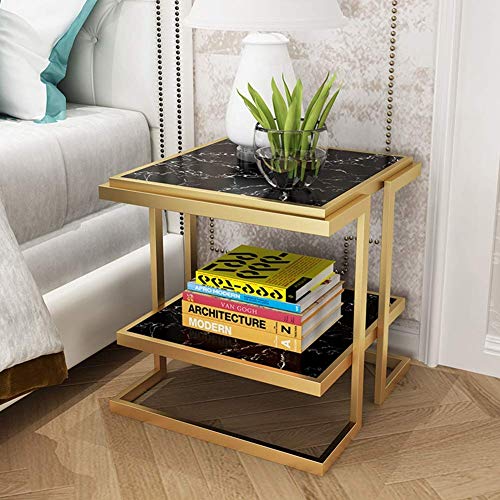 Table basse multifonction noire pour optimiser les petits salons encombrés