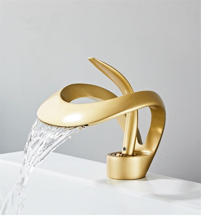 Grifo de lavabo de latón en negro y oro con caída de agua en cascada