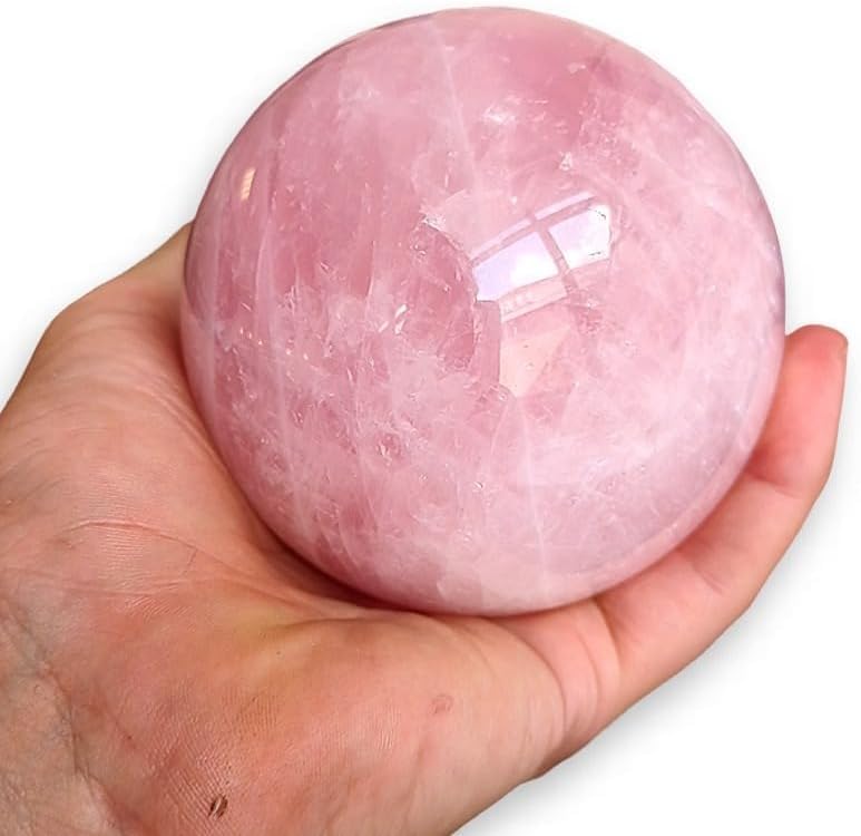 Quartz rose boule de cristal naturelle de 10 cm signée TENET pour une décoration haut de gamme