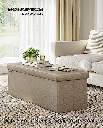 Image of SONGMICS MAZIE Collection - 43 Inches Folding Storage Ottoman Bench, Ottoman Foot Rest, End of Bed Bench, Storage Chest, Load 660 lb, for Living Room, Bedroom, Entryway, Camel Brown ULSF077R01