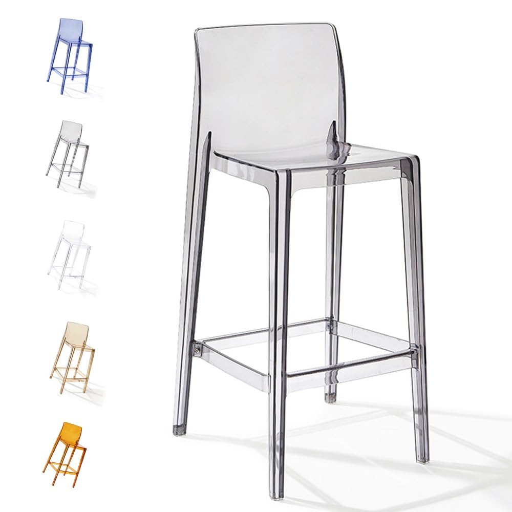 Tabourets de bar en acrylique de 65 cm de haut autour d'un îlot de cuisine moderne et épuré