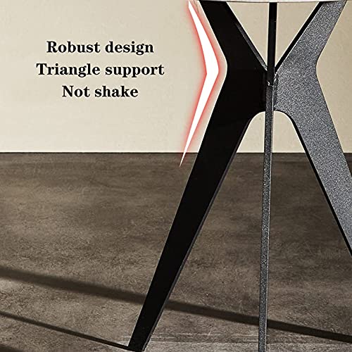 Table basse ronde en ardoise pour optimiser un petit salon