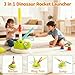 Megele 3 in 1 Dinosaur Rocket Launcher, Spinning Dinosaur Toy with Remote Control, Musical Jump and Toss, Indoor & Outdoor Sports Toys