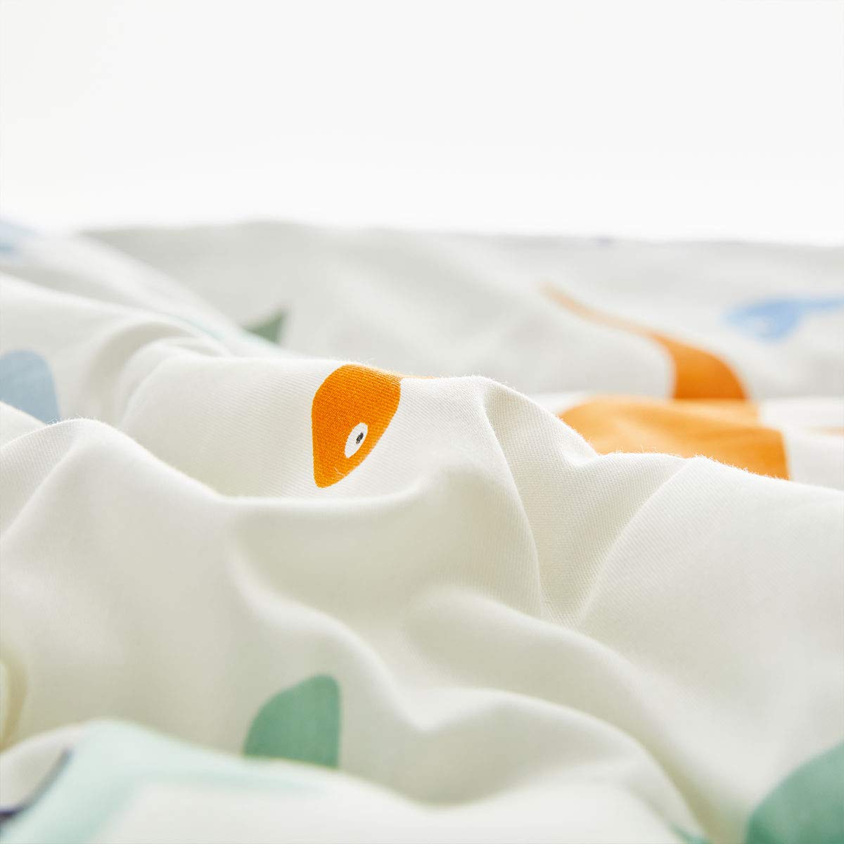 Joyreap Juego de ropa de cama de algodón de 4 piezas para niños y niñas, diseño reversible con temática de dinosaurio, color blanco y naranja, incluye edredón acolchado, sábana bajera, sábana encimera