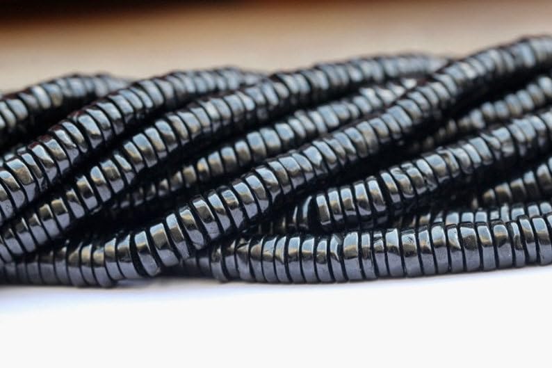 Fabrication de bijoux perles heishi lisses naturelles noires pour ranger vos fils