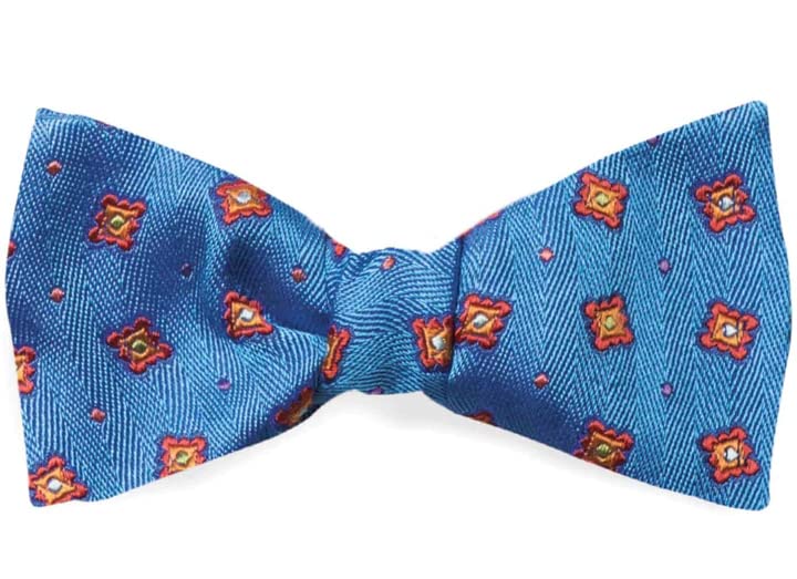 Papillon à nouer bleu ciel en soie avec motifs géométriques rouges
