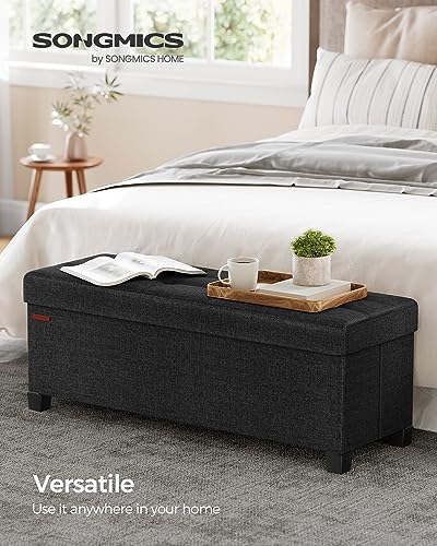 SONGMICS Storage Ottoman Bench, Foldable Foot Rest with Legs, 15 x 43 x 15.7 Inches, End of Bed Bench, Storage Chest, Load up to 660 lb, for Living Room, Bedroom, Entryway, Ink Black ULSF018B01 image 3