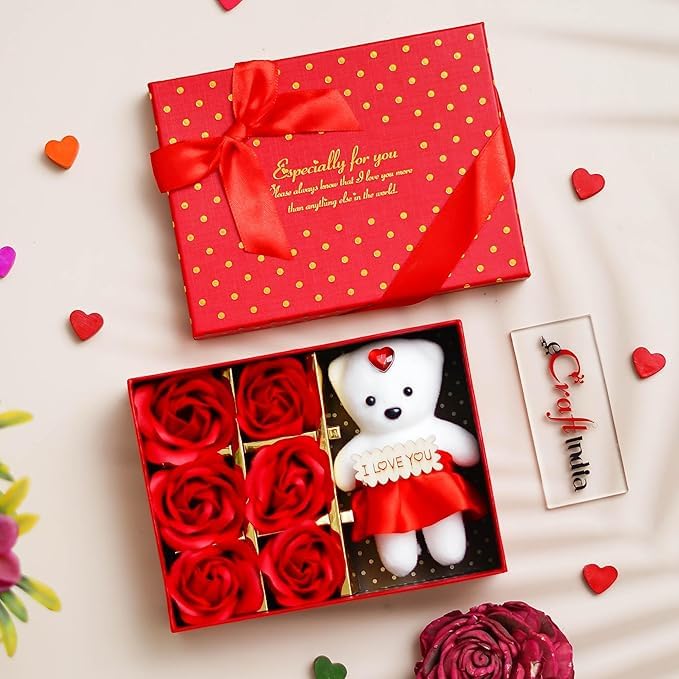 Ours en peluche avec roses contre les cadeaux éphémères de Saint-Valentin