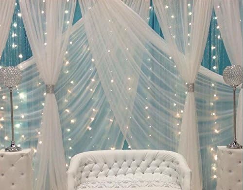 USA. Sheer Voile fabric, is a 118" wide width for curtains and event decorations, sold by yard (5yds, red)