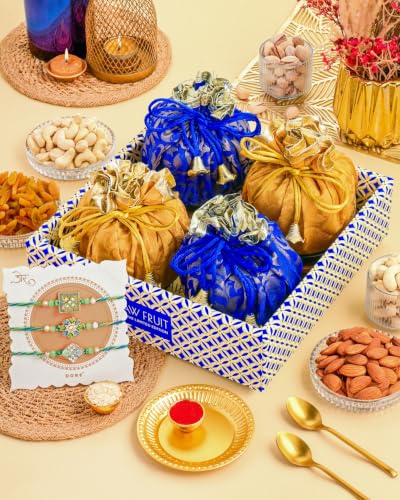 Image of Hyperfoods Rakhi for Brother with Dry Fruits Rawfruit's Handcrafted Potli Blue And Red with Thali Roli & Chawal Rakhi Gift Hamper for Brother Pack of 4 Cashew Almond Pistachios Raisins 495gm With Set of 3 Meena Rakhi