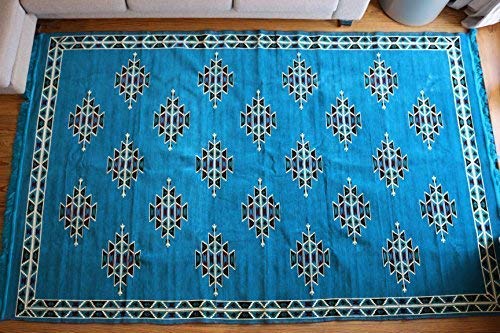 Tapis en papier damassé bleu d'exception 200 x 300 cm Celim