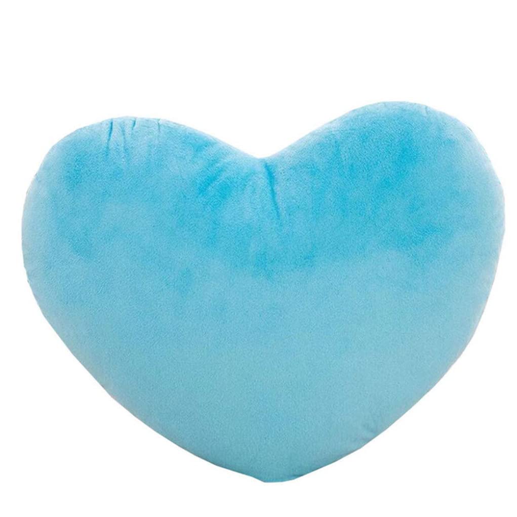 Coussin en forme de cœur bleu pour soulager les cervicales et décorer un lit fatigué