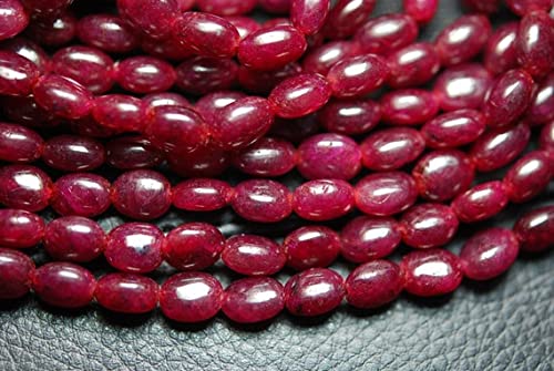 Rubis perles ovales lisses pour créer vos propres bijoux de soirée élégants