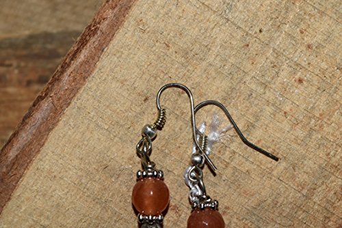 Orecchini pendenti con pietre di agata e metallo