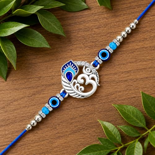 Image of Riddhika Ventures Religious Meenakari Om and Peacock Feather Rakhi With Roli Chawal And Greeting Card