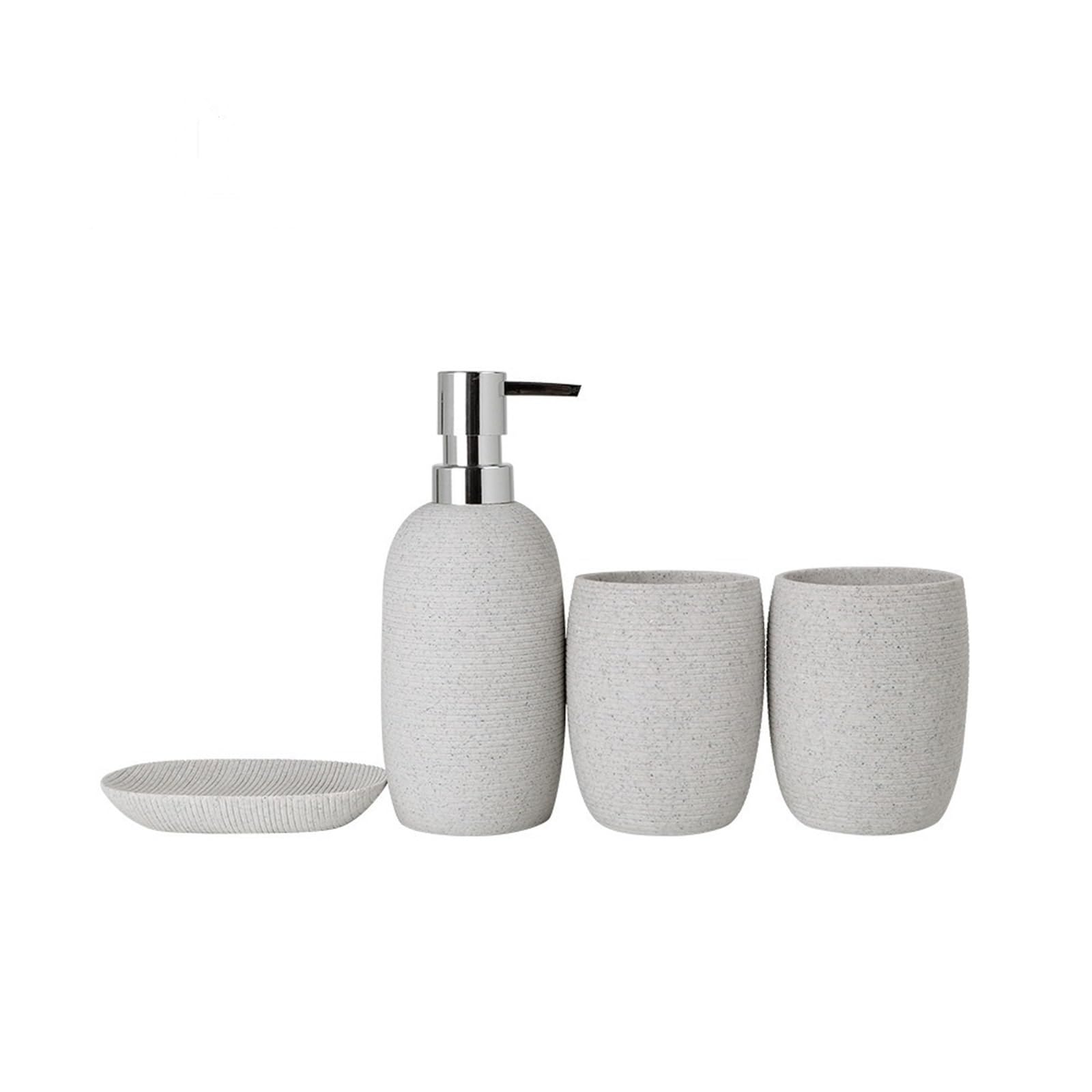 Dispensador de jabón y vaso de baño gris con acabado minimalista