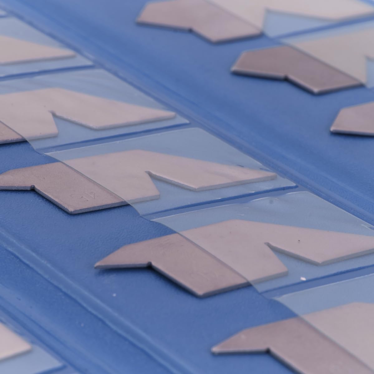 Close-up of Dasqua angle gages stored in a blue tray