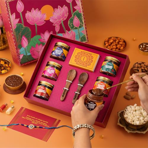Image of Gladful Premium 10 Items Rakhi Gift Box | Pink Lotus Keepsake Hamper with Premium Nuts, Cranberries, Chocolate Spreads & Rakhi | Luxurious Raksha Bandhan Gift