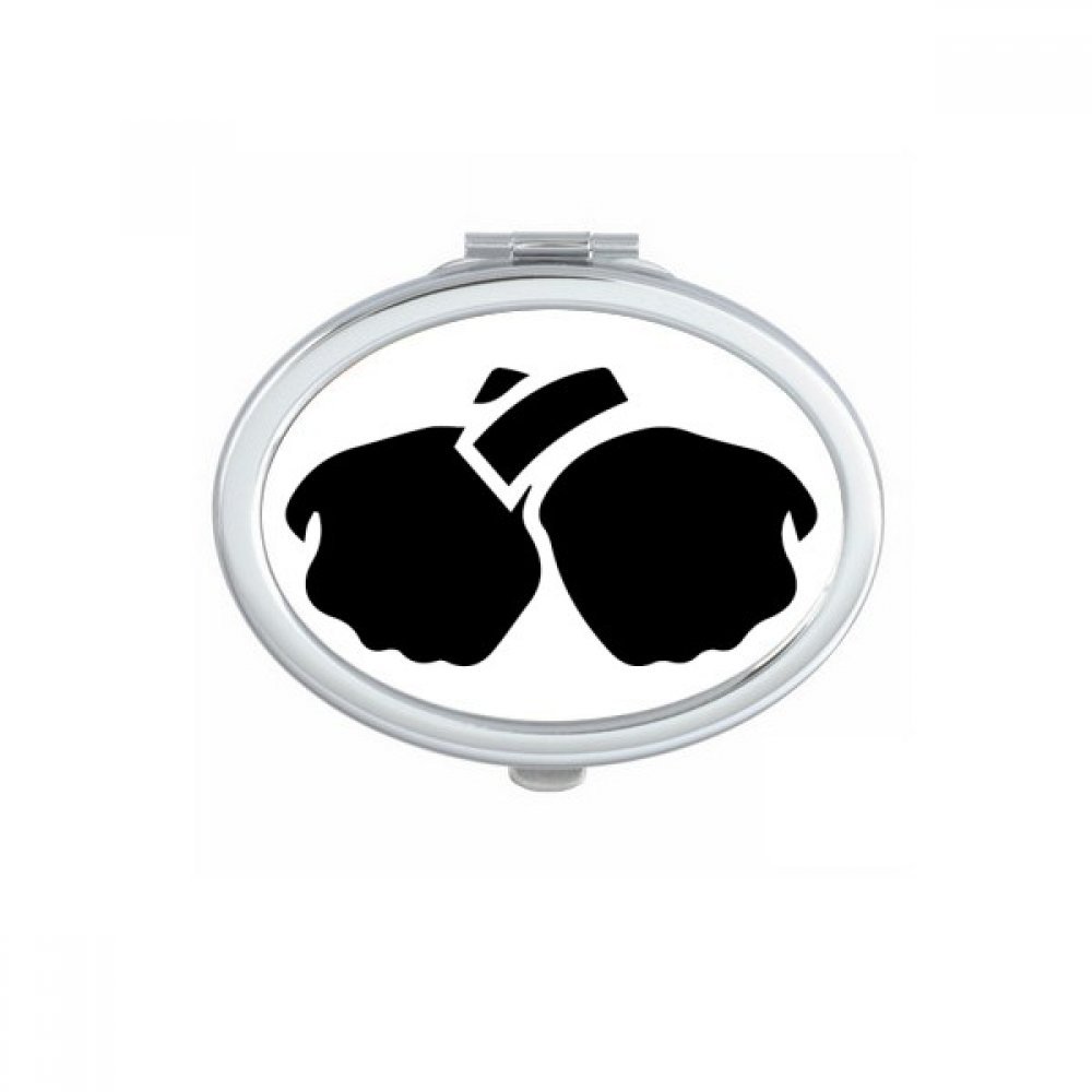 Miroir de maquillage compact noir silhouette ovale portable et ergonomique pour retouches