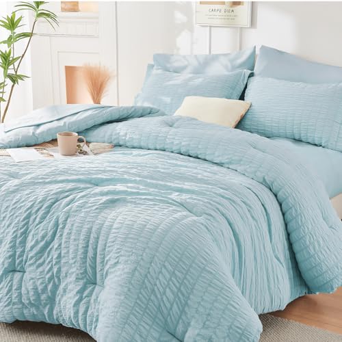 Image of HYMOKEGE Lake Blue Oversized Queen Comforter Set Seersucker 7 Pieces, All Season Luxury Bed in a Bag for Bedroom, Bedding Set with Comforter, Sheets, Pillowcases & Shams