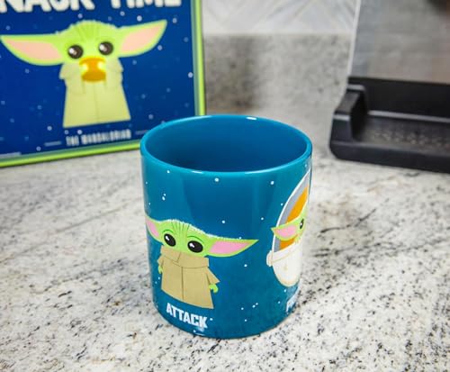 Image of Silver Buffalo Star Wars The Mandalorian The Child Baby Yoda Grogu Protect Attack Snack Ceramic Coffee Mug, 20-Ounces