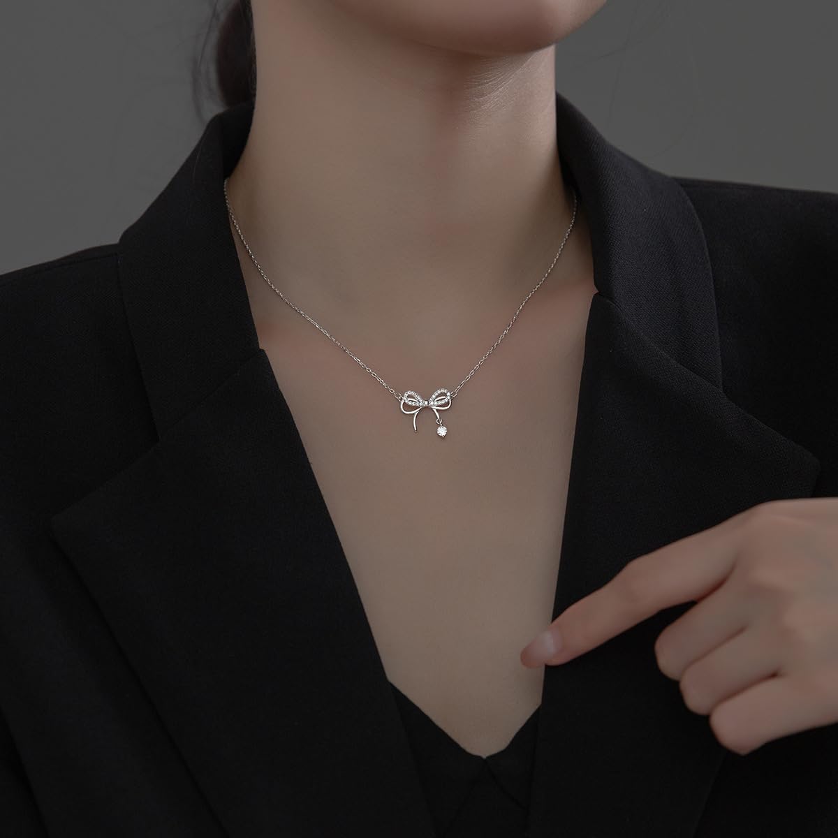 SLUYNZ 925 Sterling Silver Bow Choker Necklace for Women Teens CZ Bow Choker Necklace Pendant Bow Ribbon Necklace - Image 5