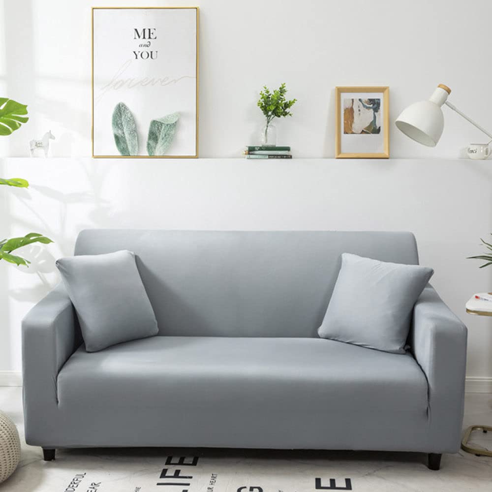 Housse de canapé d'angle couleur unie au design épuré pour salon moderne